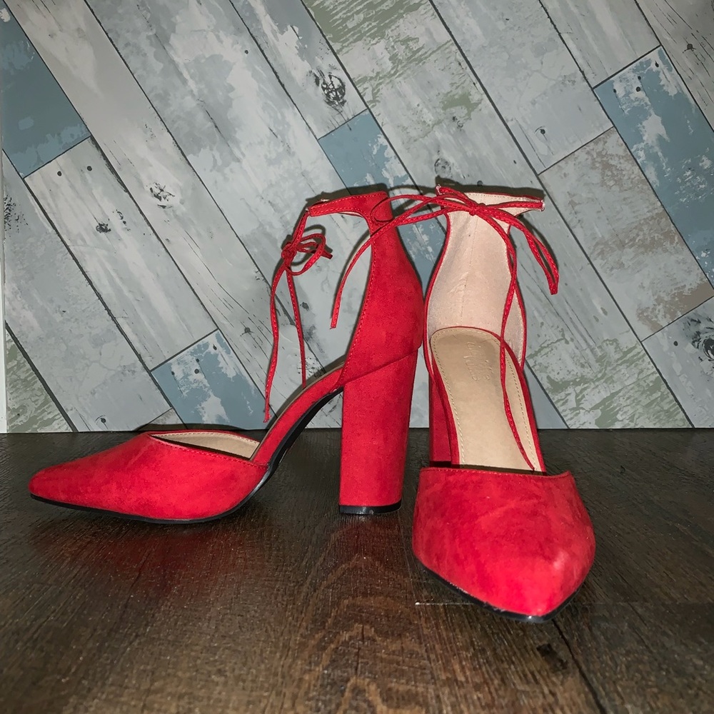 Red suede heels, pointed toe
